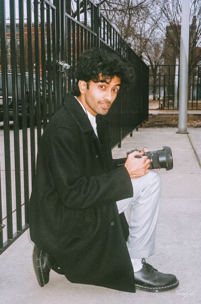 Abin Thomas holding a professional camera