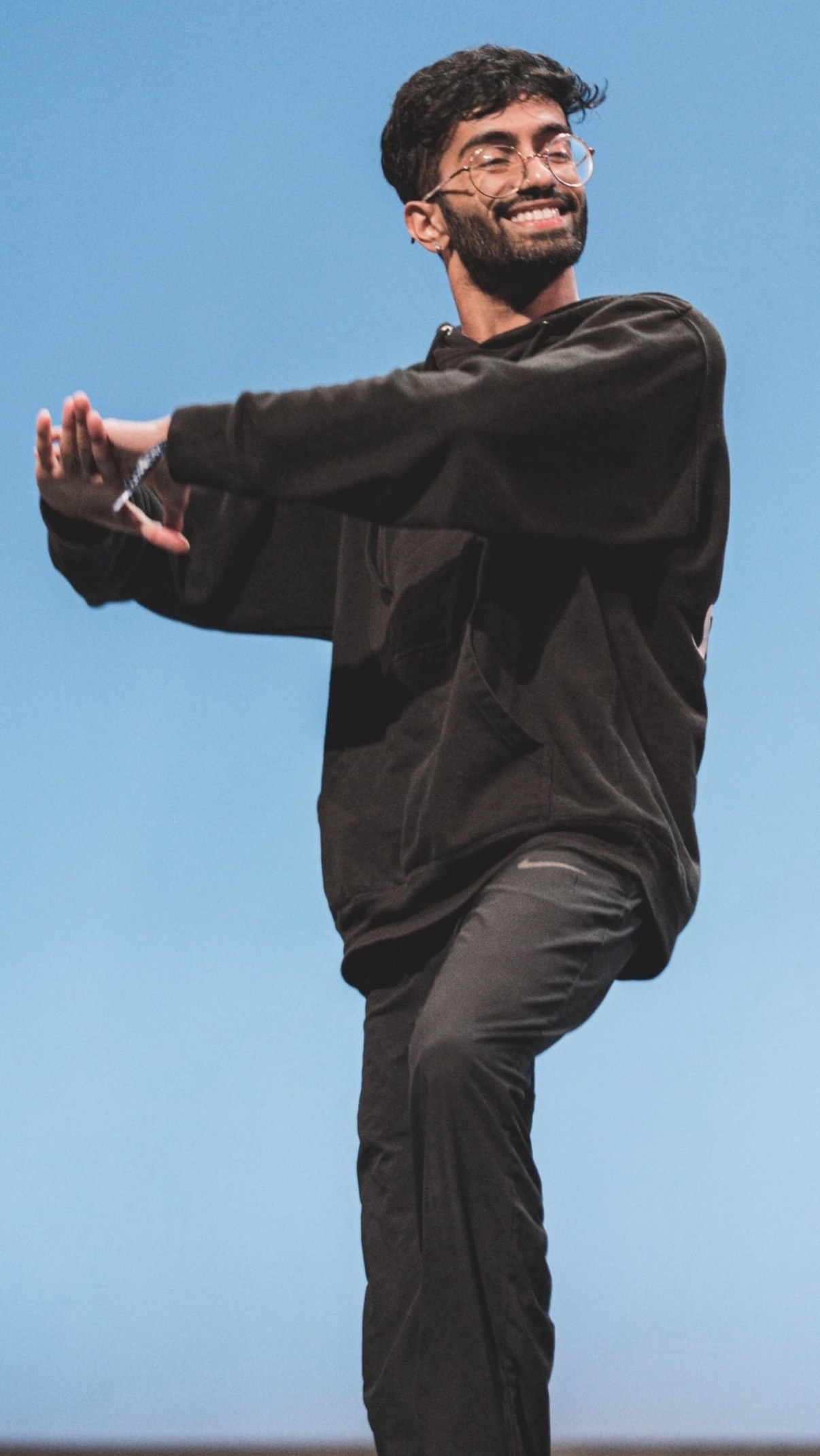 Abin Thomas dancing on stage