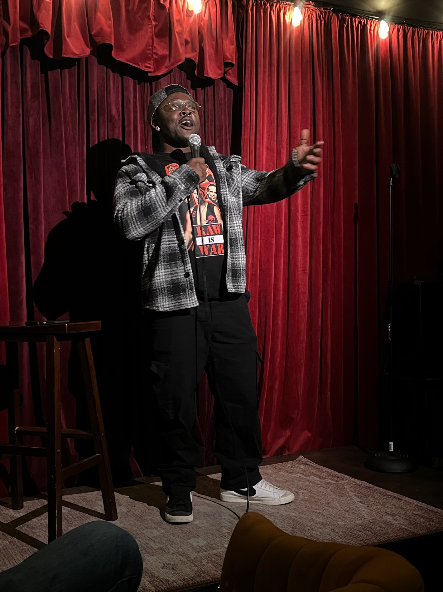 Rick Blaze performing stand-up comedy on stage