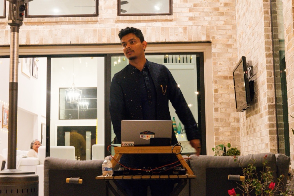 Sidd Chauhan performing a DJ set at a live event